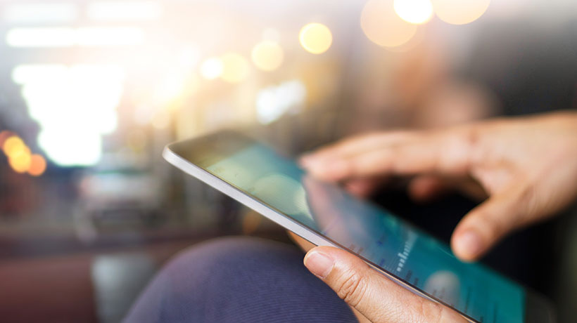 Close-up on person's hands on a phone